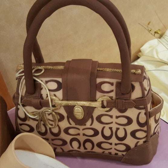 Sculpted Cake - Coach Purse Cake. I just might tear up! Coach purse AND cake,  catch me while I swoon.